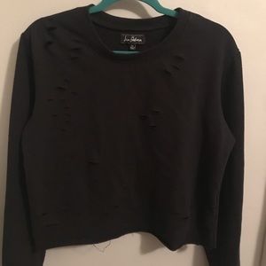 Sam Edelman cropped black shredded sweatshirt.